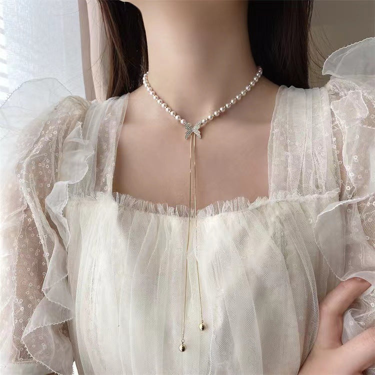 BUTTERFLY PEARL NECKLACE