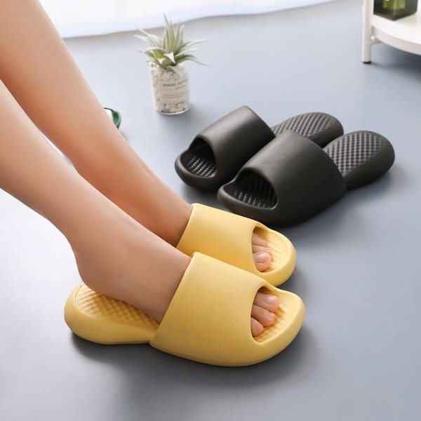 Non slip wear resistant thick soled super soft slippers